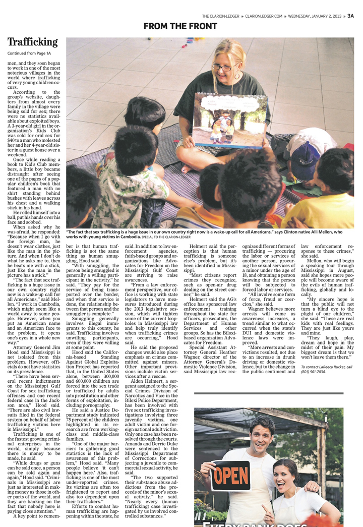 A picture of a newspaper article about human trafficking.