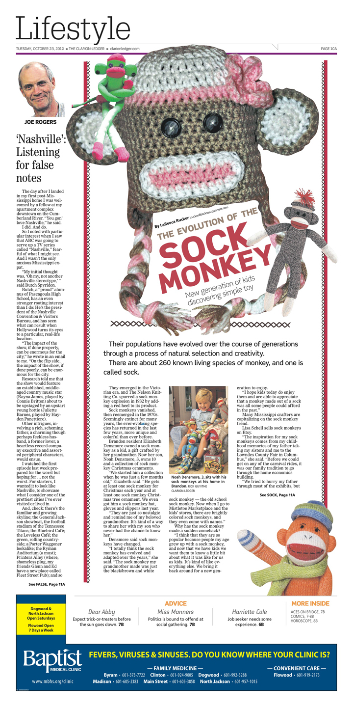 This is a picture of a newspaper page with a story about sock monkeys.